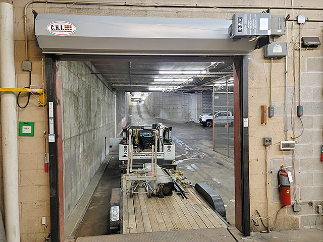Gateway commercial team repairing a commercial garage door