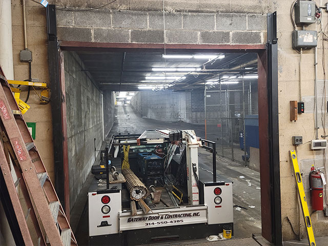 Gateway commercial team repairing a commercial garage door